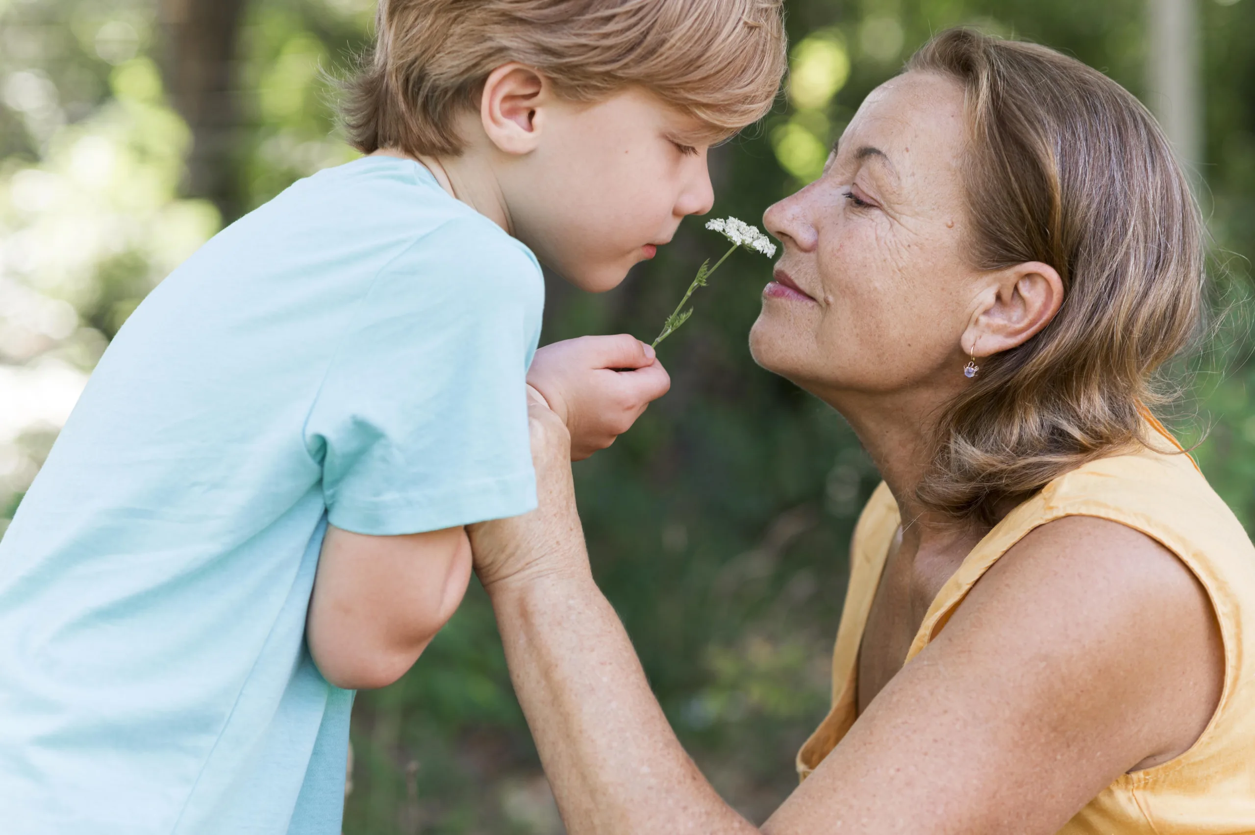 side-view-kid-holding-flower