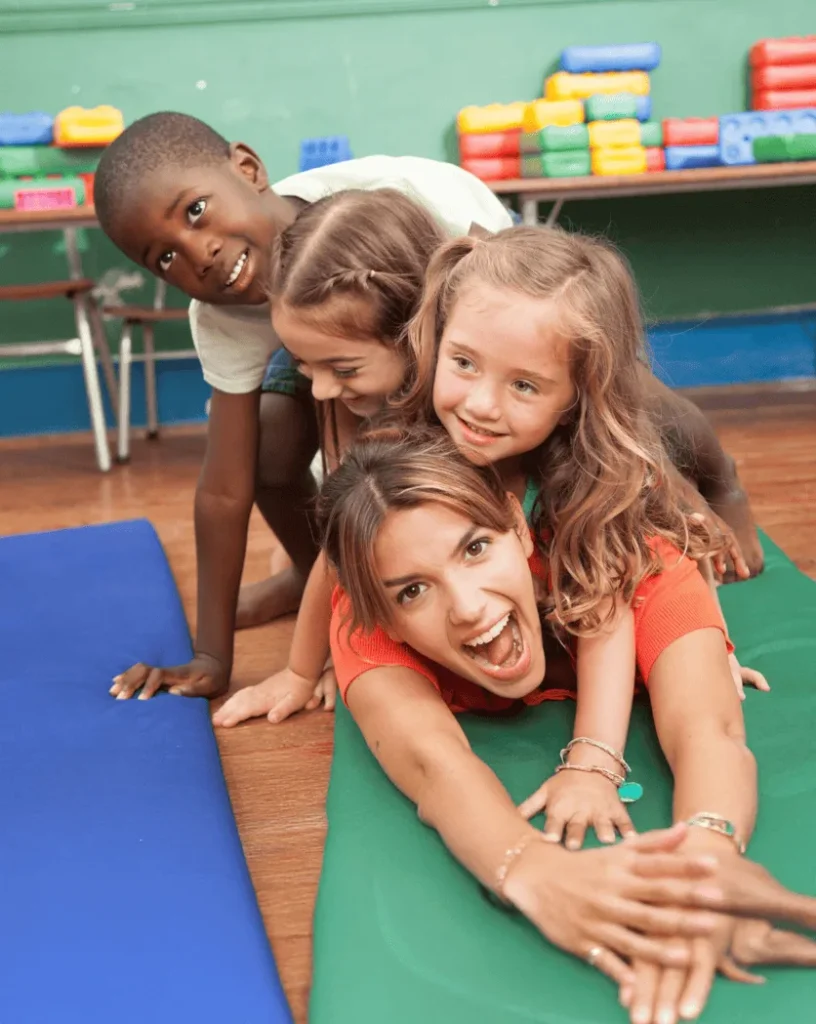 Teacher and children in a classroom